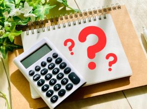 計算機とクエスチョンマーク